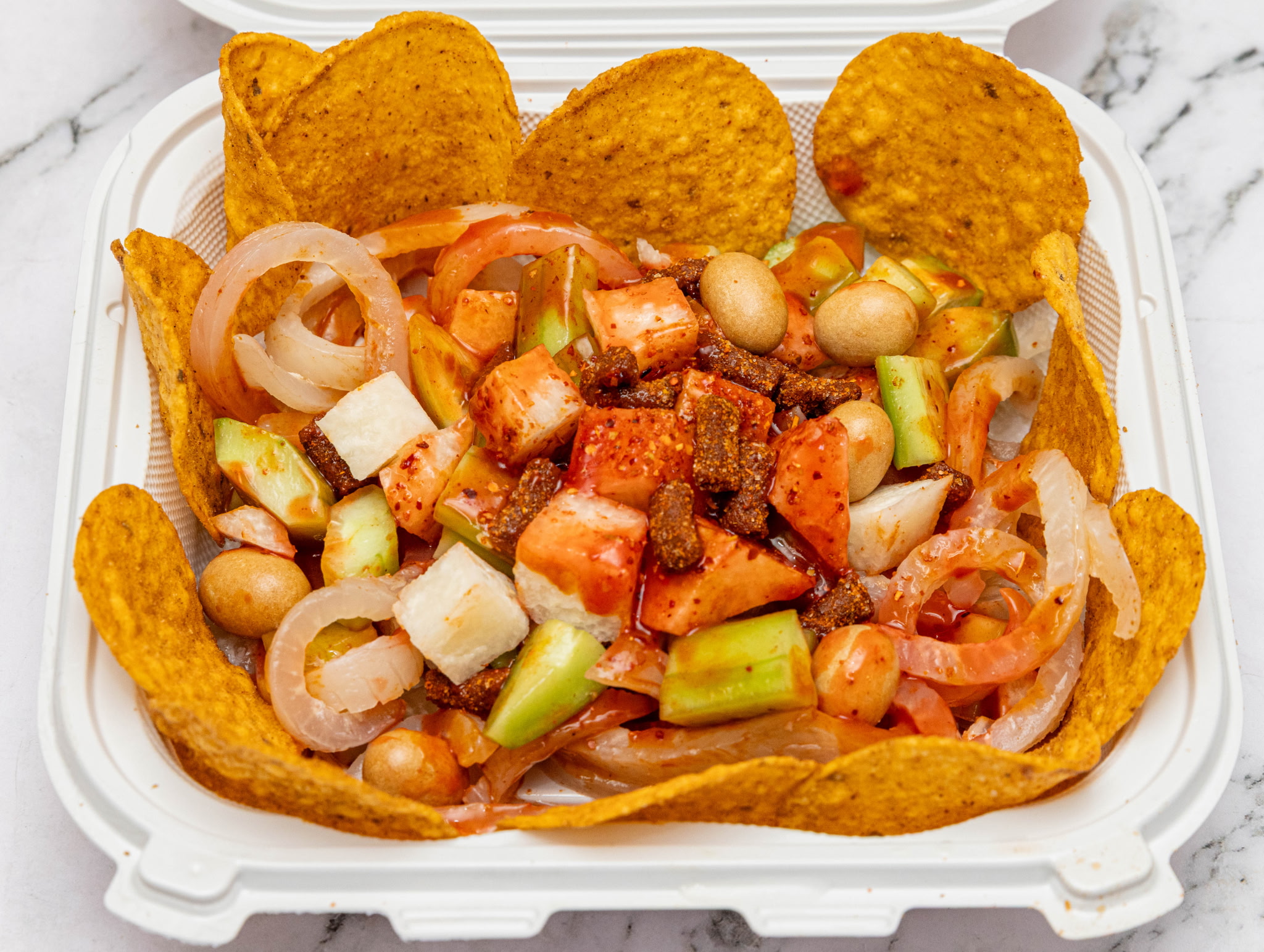 Pico de gallo fruit cup with Doritos