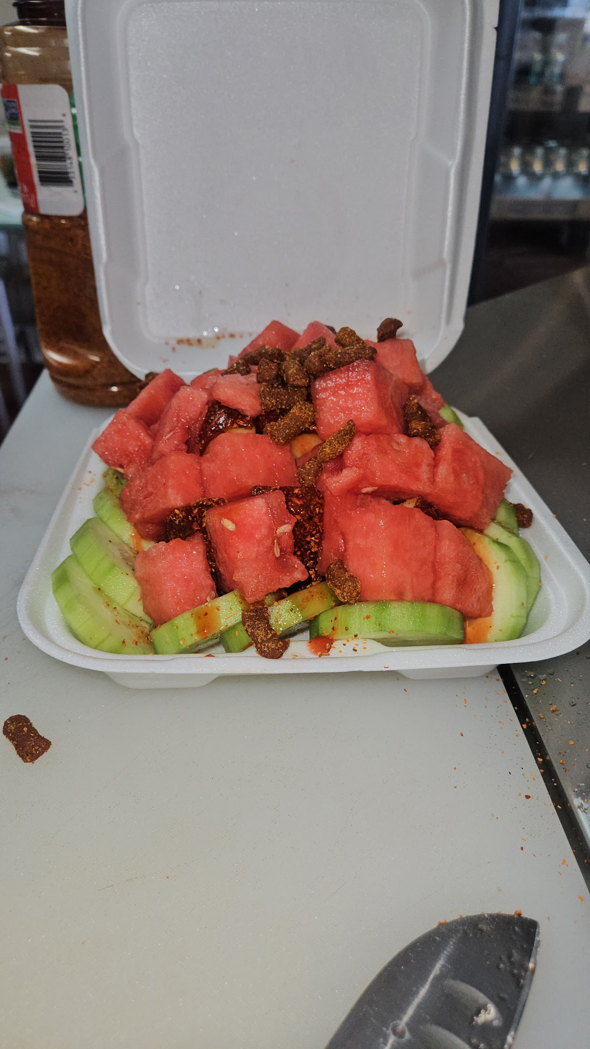Fresh watermelon and cucumber cup with chamoy